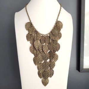 Dramatic metal hanging layered leaf necklace